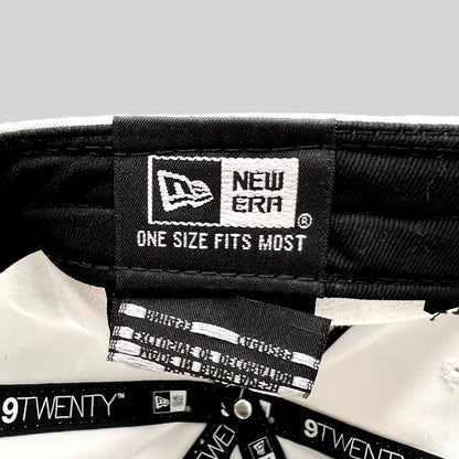 Raree Finds New Era 9TWENTY hat interior showing brand tag and size label on white cotton cap