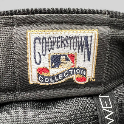 Raree Finds New Era Cooperstown Collection embroidered interior label on a black corduroy Brooklyn Dodgers hat