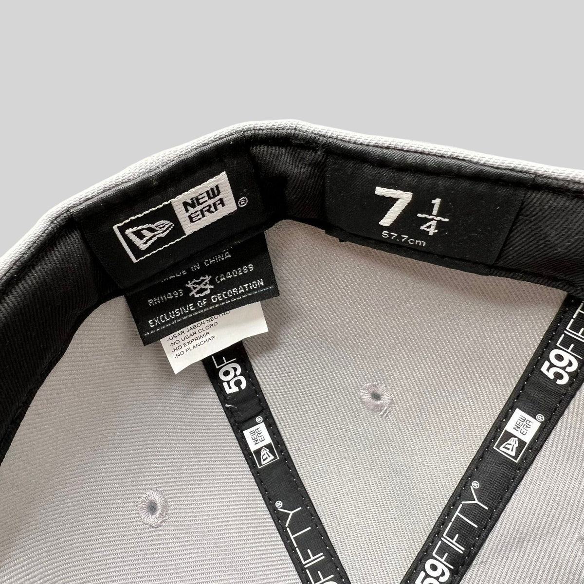 Raree Finds New Era 59FIFTY fitted hat interior tag showing size 7 1/4 and official branding