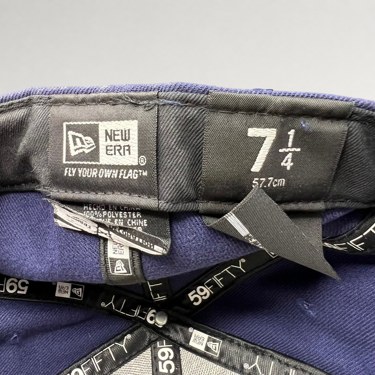 Raree Finds New Era 59FIFTY navy fitted hat interior label showing size 7 1/4 and authentic branding details