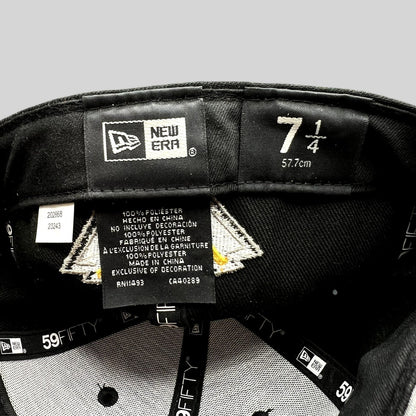 Raree Finds New Era 59FIFTY fitted hat interior tag showing size 7 1/4 and 100% polyester material details