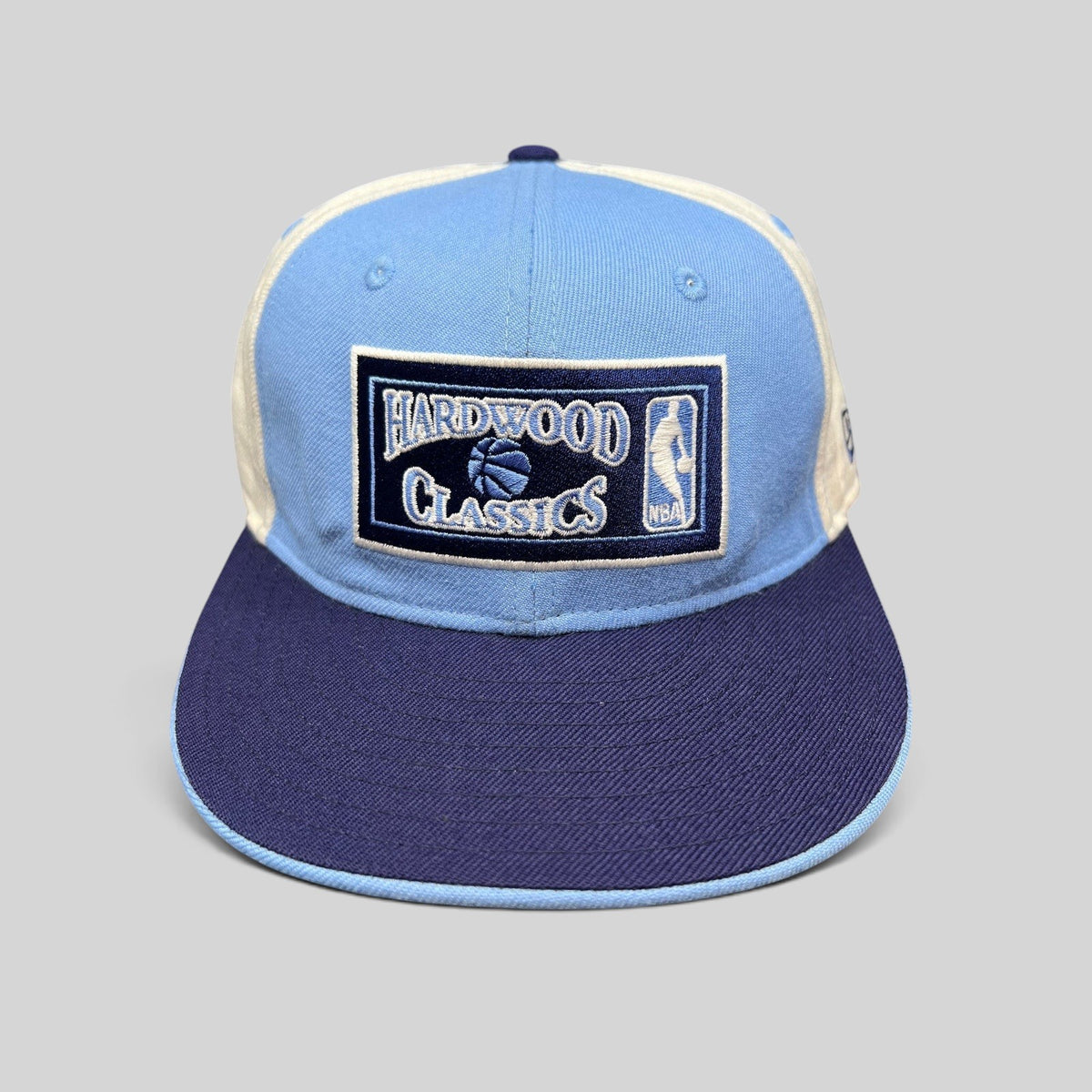 Raree Finds New Era 59FIFTY Hardwood Classics fitted hat in light blue, navy, and cream with front NBA embroidery.