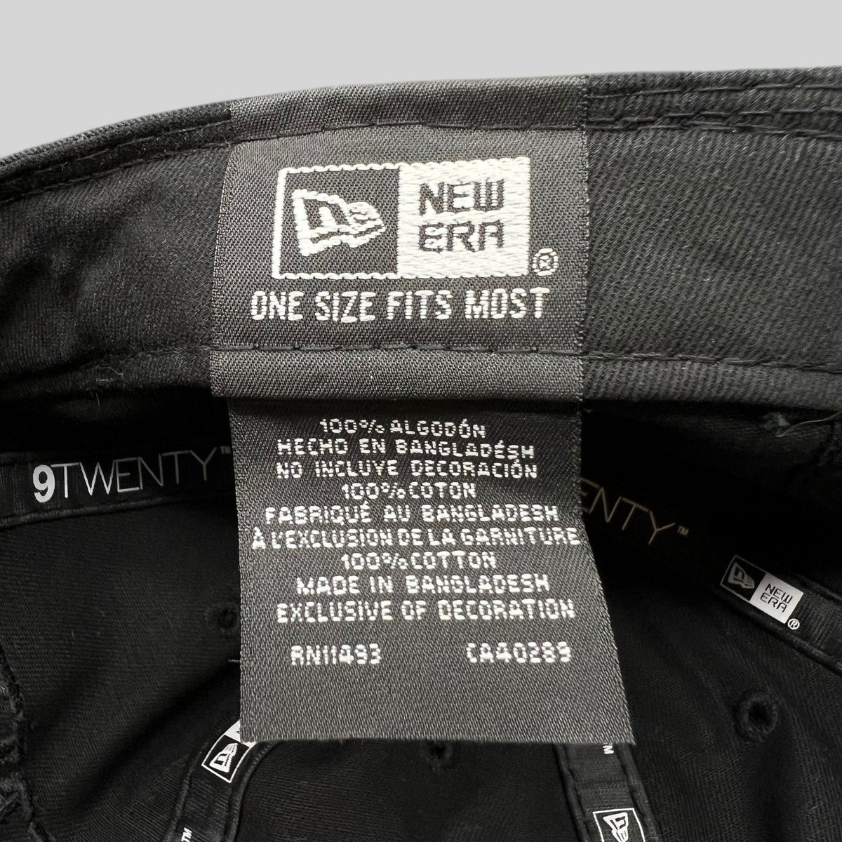 Raree Finds New Era 9TWENTY black cotton hat interior care label showing brand and material details
