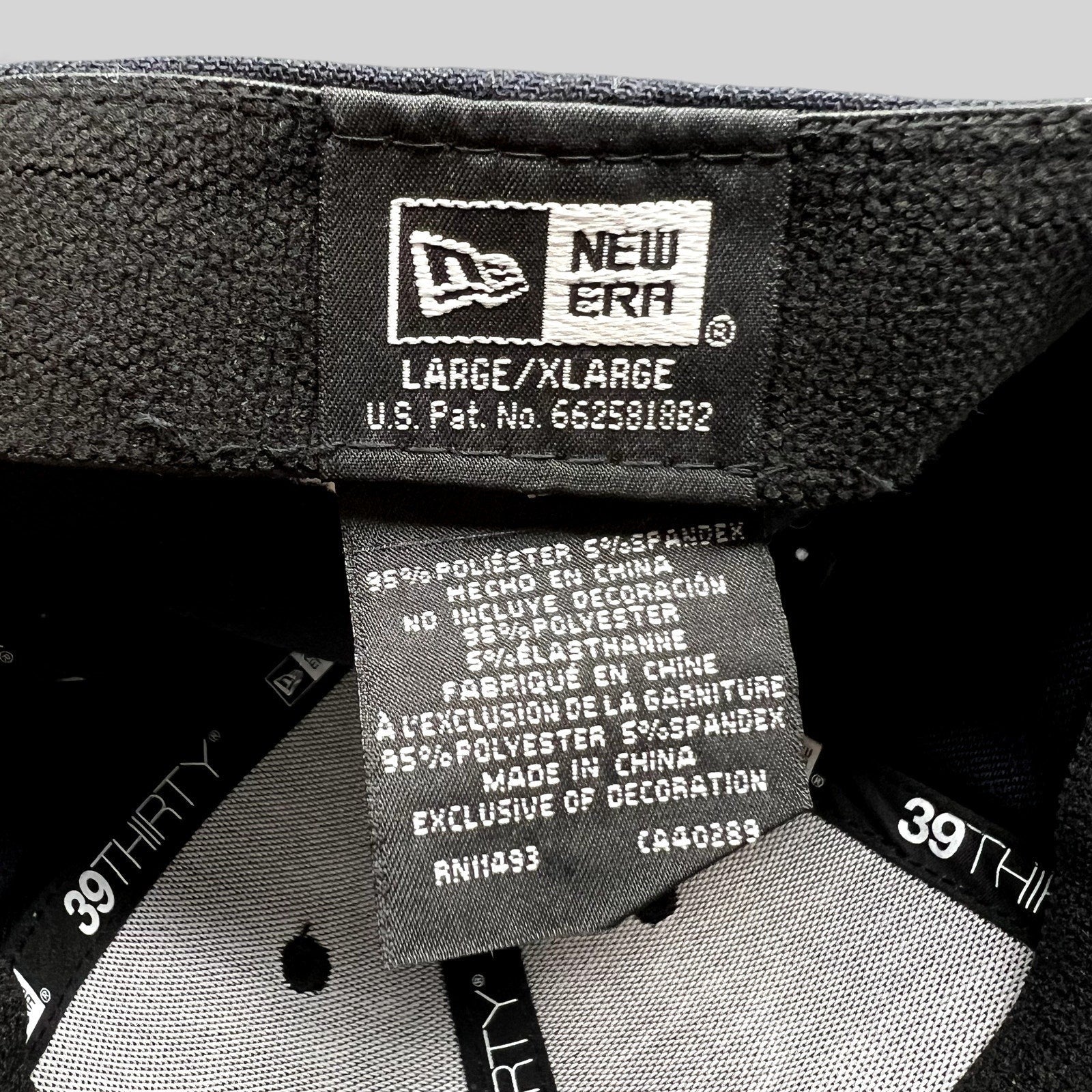 Raree Finds New Era 39THIRTY flex fit hat interior label showing size L/XL and polyester spandex material details