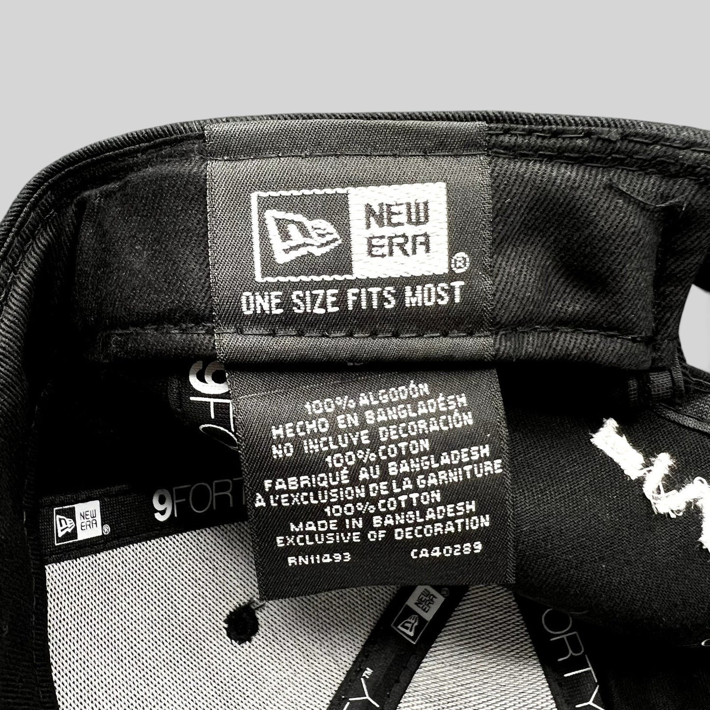 Raree Finds New Era 9FORTY hat interior label showing 100 percent cotton material and one size fits most branding