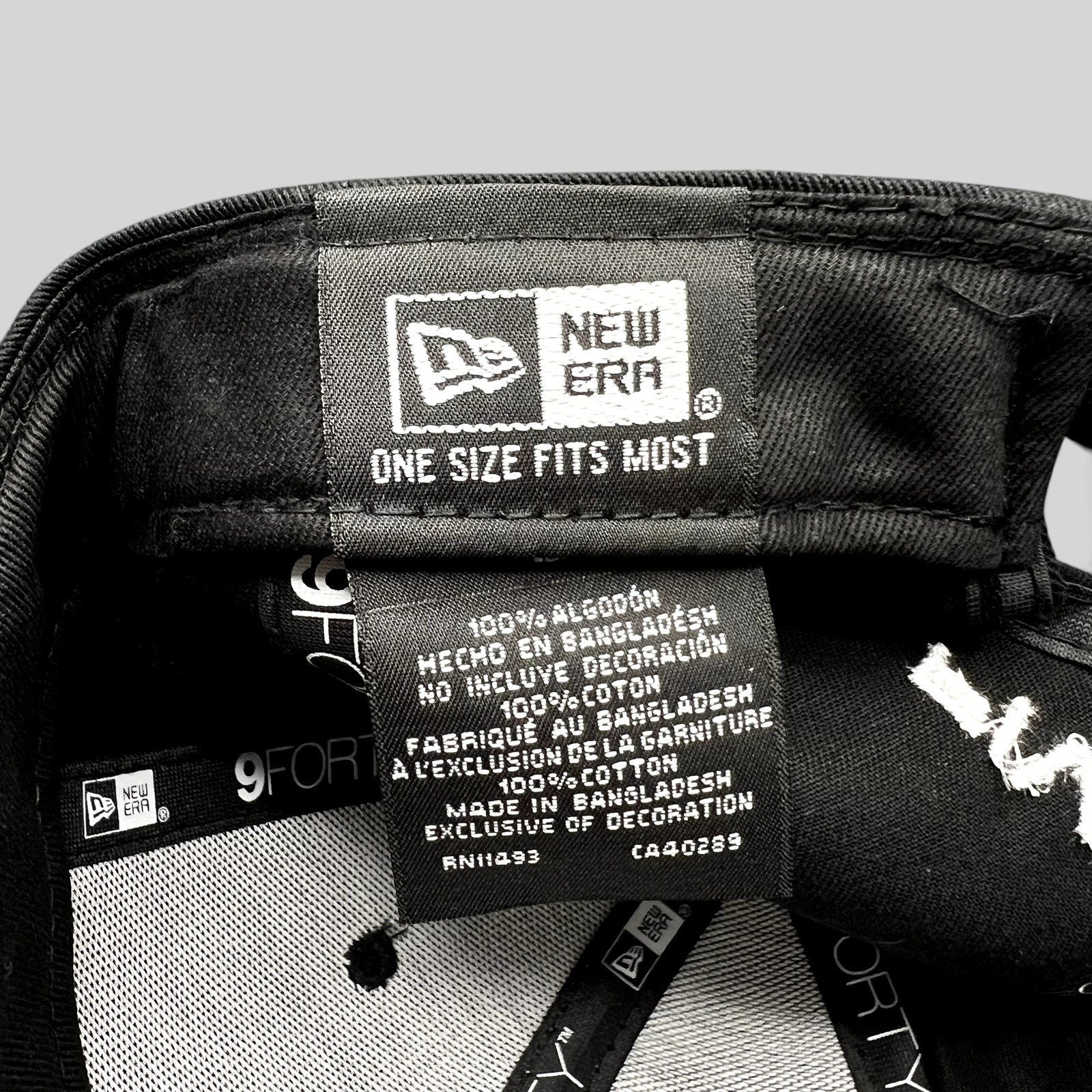 Raree Finds New Era 9FORTY hat interior label showing 100 percent cotton material and one size fits most branding