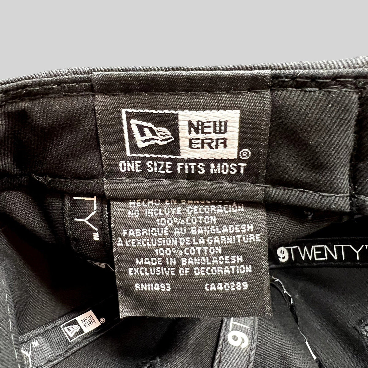 Raree Finds New Era 9TWENTY hat interior label showing cotton material and manufacturing details