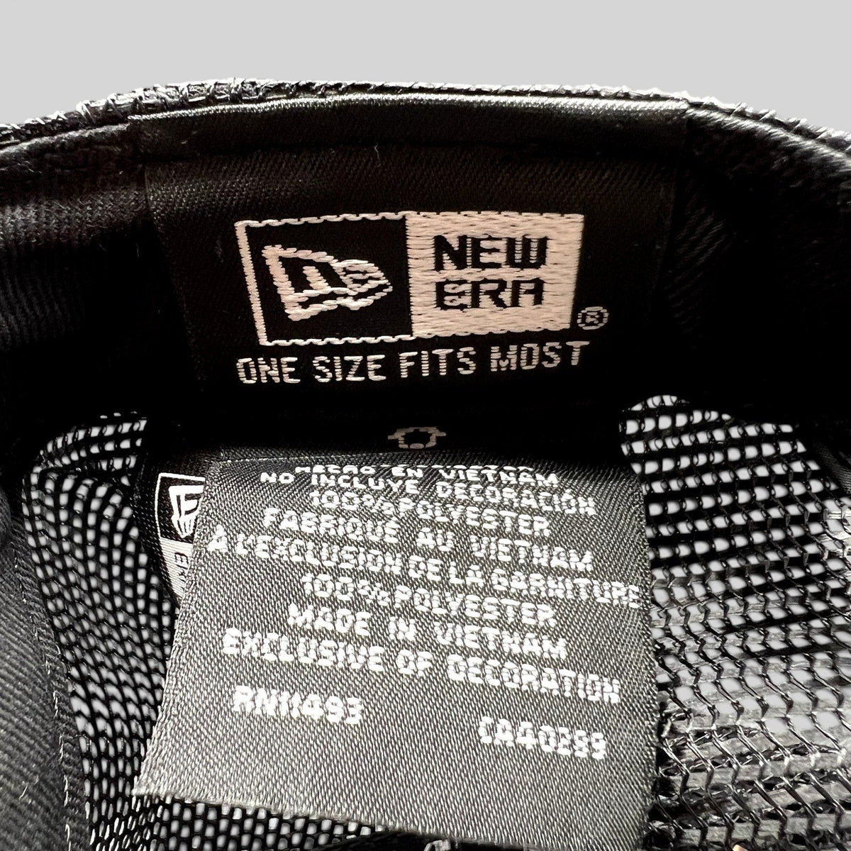 Raree Finds New Era Super Bowl LVI hat interior tag showing 100 percent polyester material and Vietnam origin