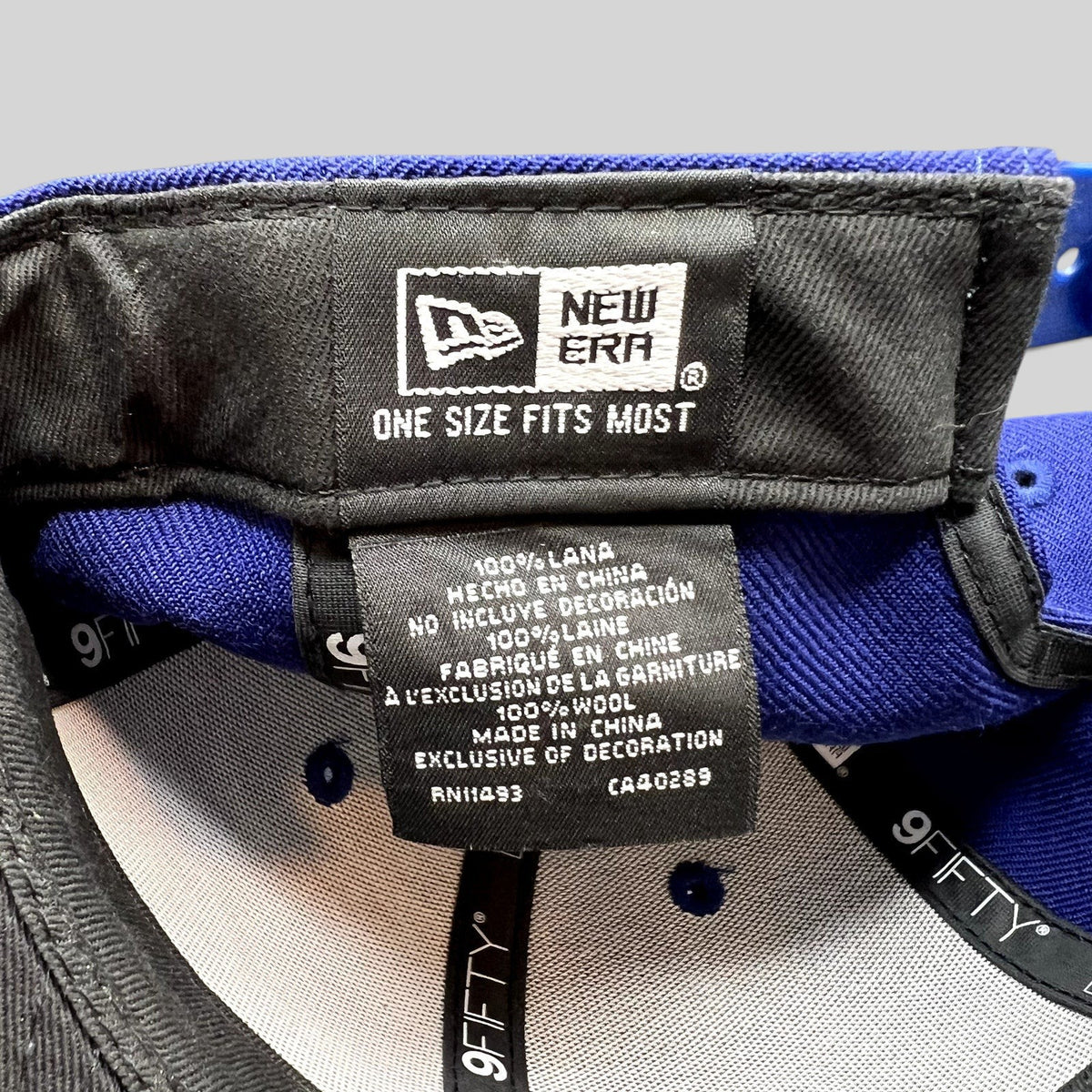 Raree Finds New Era 9FIFTY snapback hat interior label showing 100 percent wool material and manufacturing details