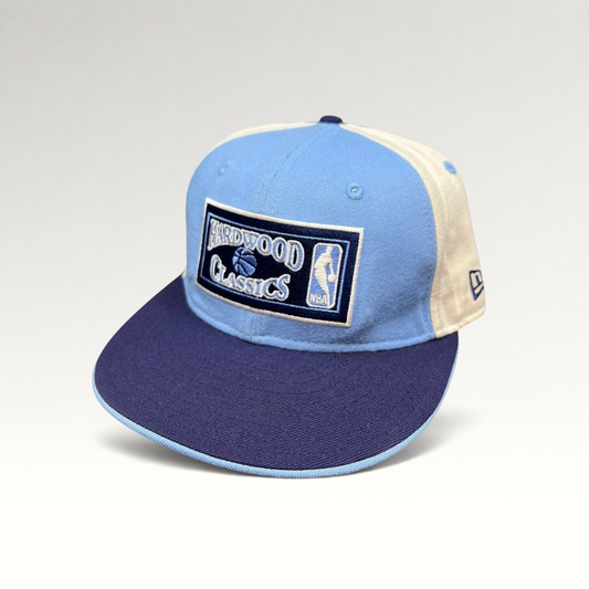Raree Finds New Era 59FIFTY Hardwood Classics NBA fitted hat in light blue, navy, and cream with front embroidery.