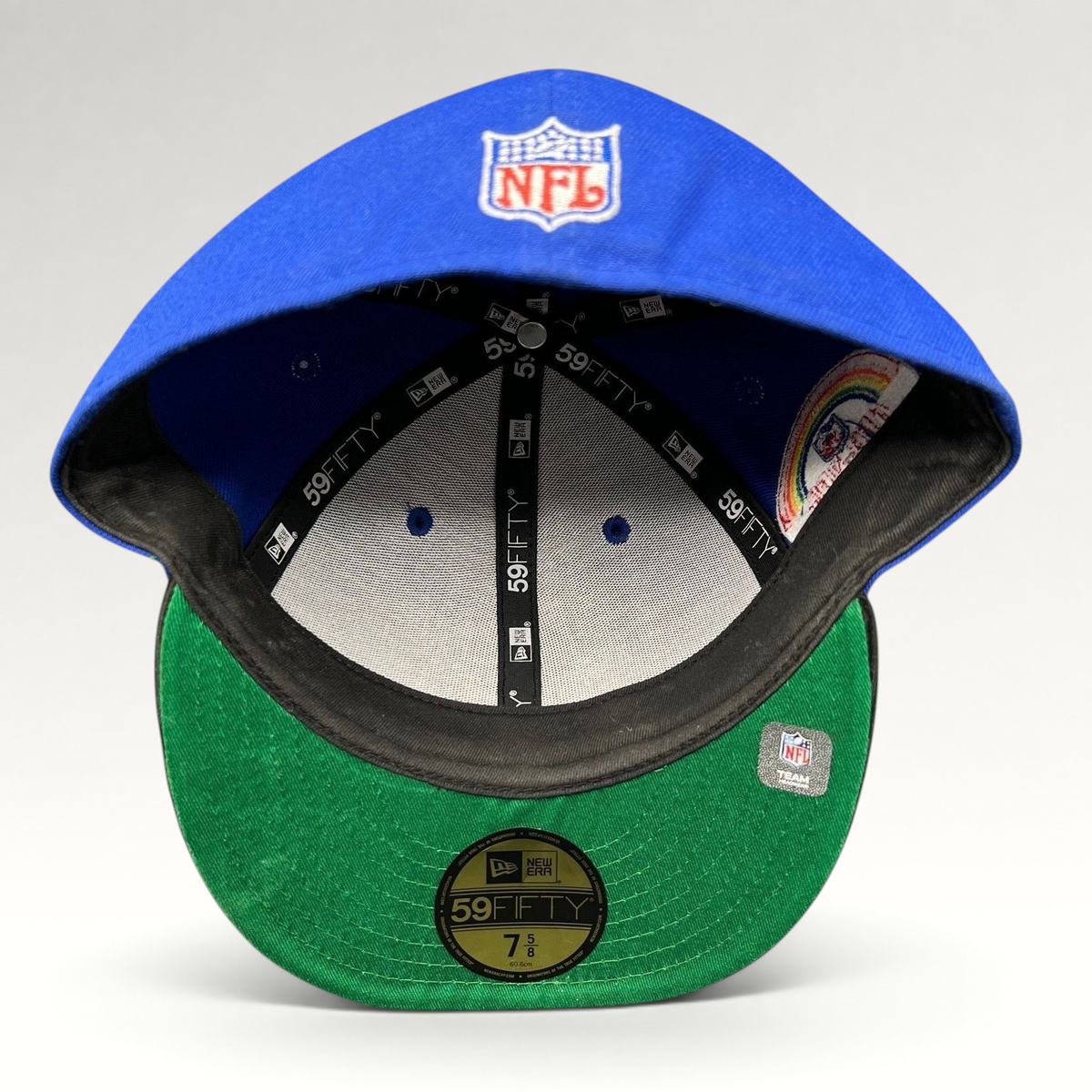 Raree Finds New Era 59FIFTY New England Patriots fitted hat interior showing green undervisor and branding details