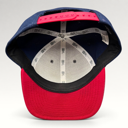 Raree Finds New Era Red Bull snapback hat interior view showing navy panels, red brim, and branded seam tape.
