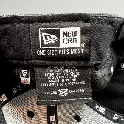 Raree Finds New Era 9FIFTY snapback hat interior label showing 100 percent polyester material and one size fit