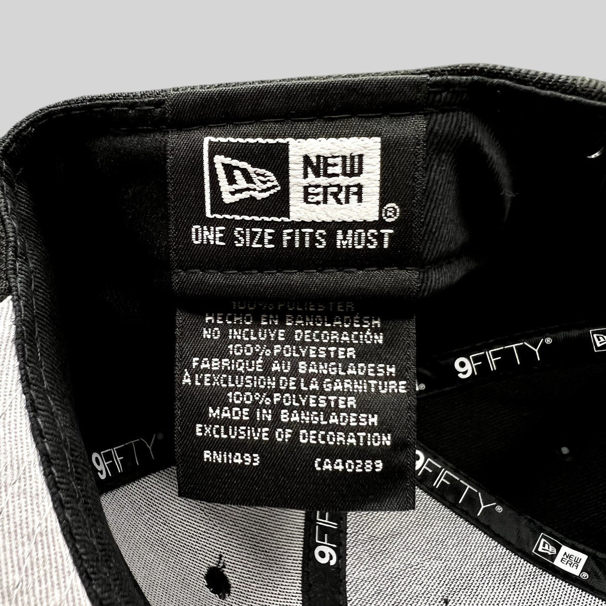 Raree Finds New Era 9FIFTY snapback hat interior label showing polyester material and size information