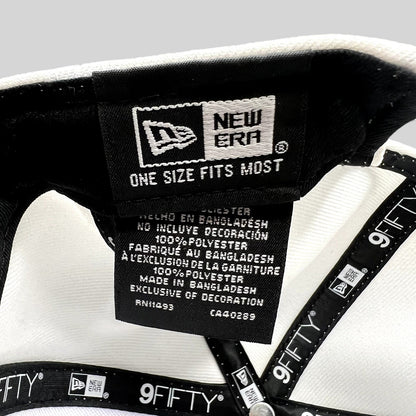 Raree Finds New Era 9FIFTY snapback interior label showing 100 percent polyester material and one size fits most tag
