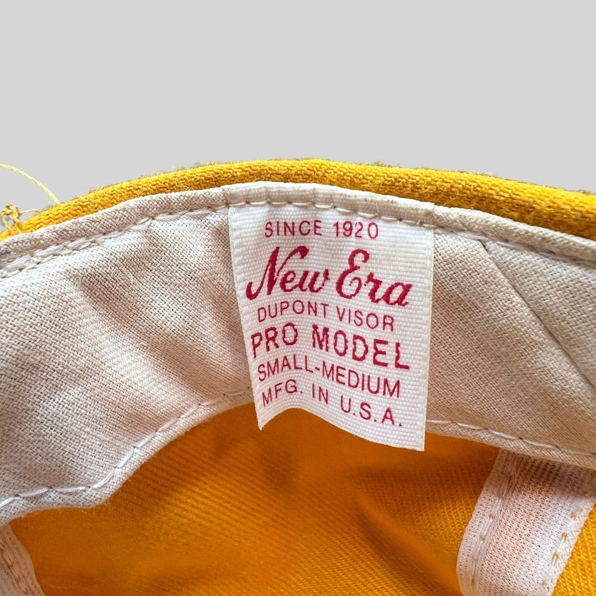 Raree Finds vintage New Era Pro Model cap interior label showing Dupont visor and USA made construction details