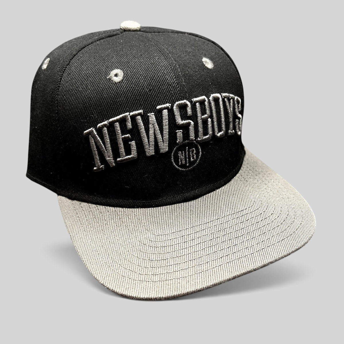 Raree Finds official Newsboys Love Riot snapback hat in black and gray with raised 3D embroidered band logo