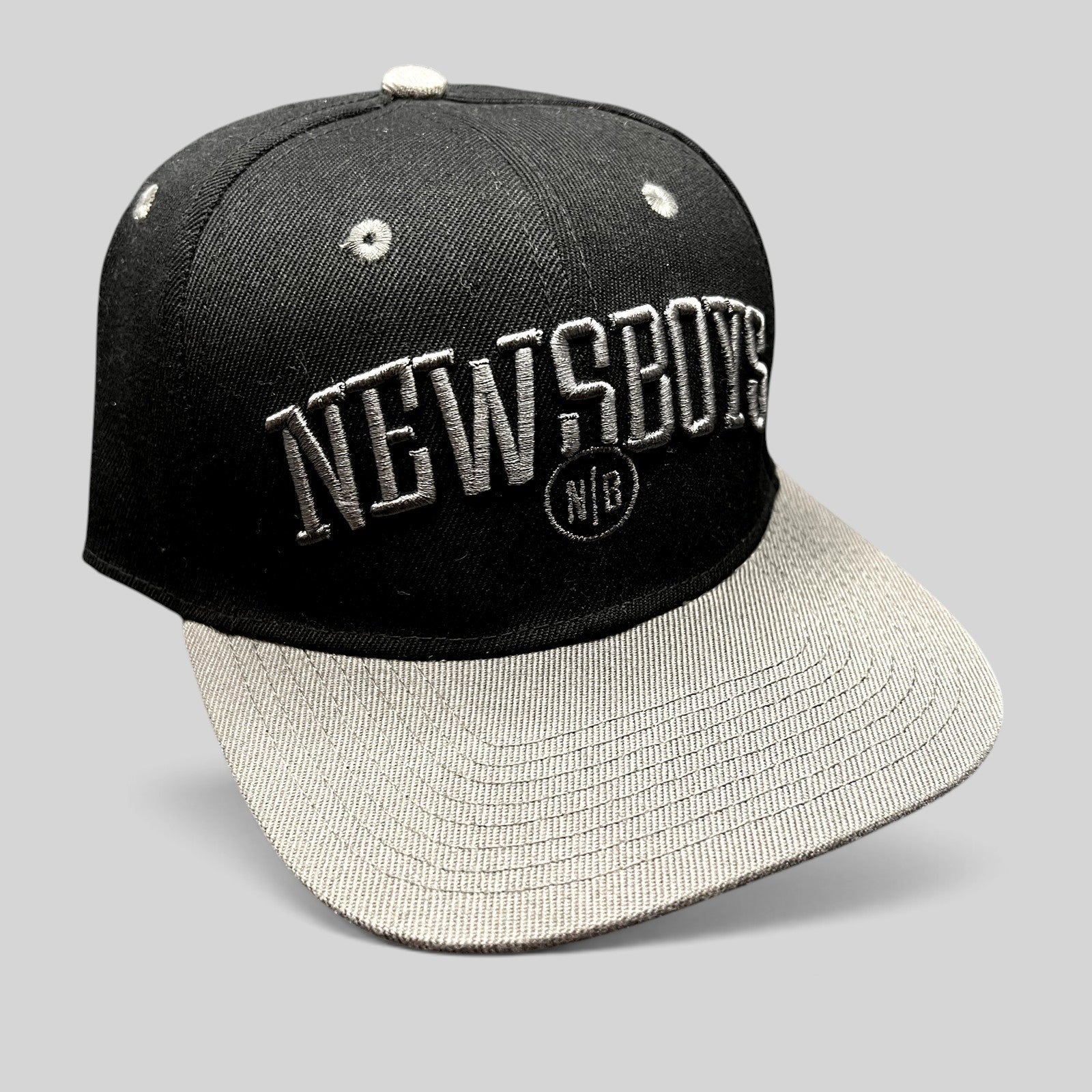 Raree Finds official Newsboys Love Riot snapback hat in black and gray with raised 3D embroidered band logo