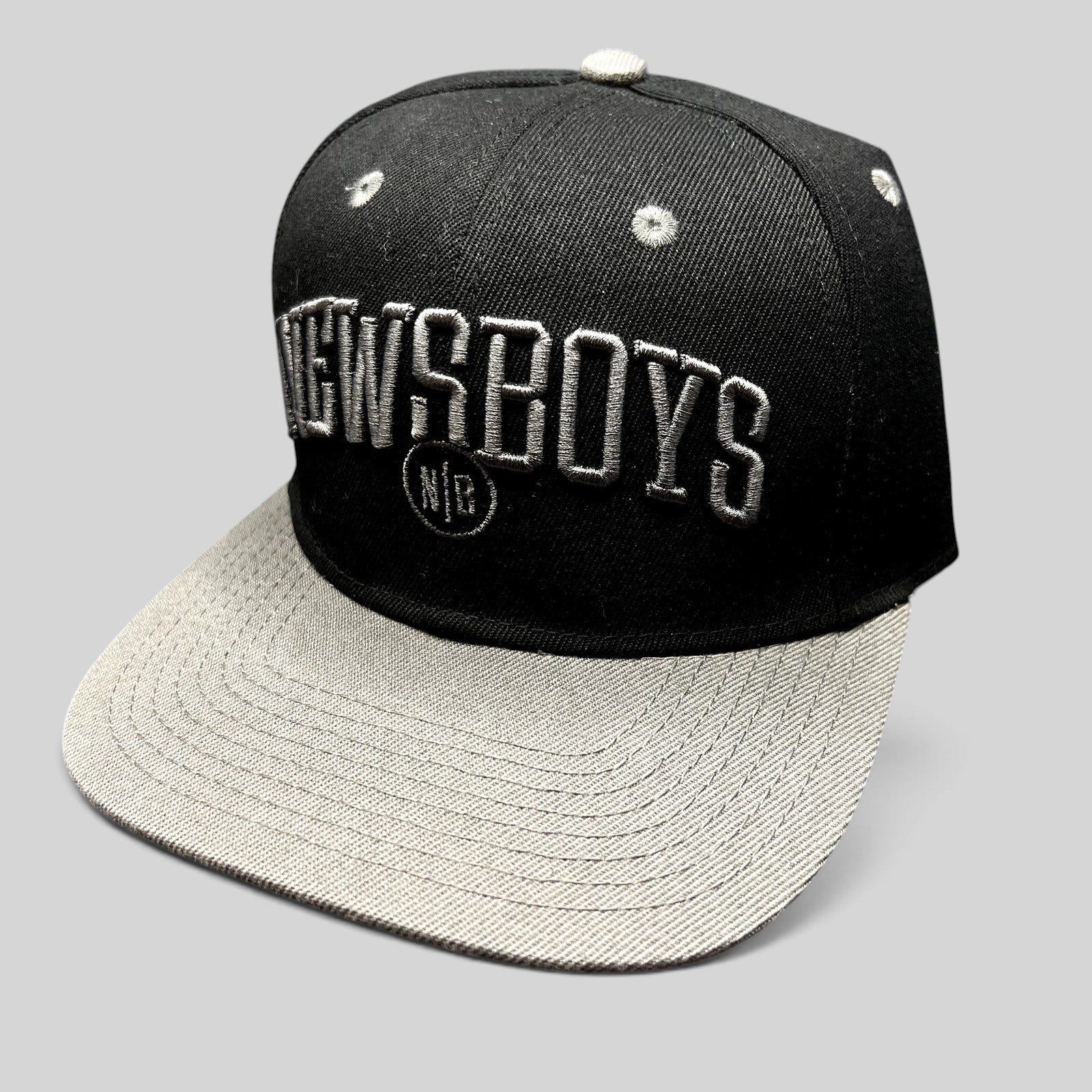 Raree Finds Newsboys Love Riot snapback hat in black and gray with raised 3D lettering and flat brim
