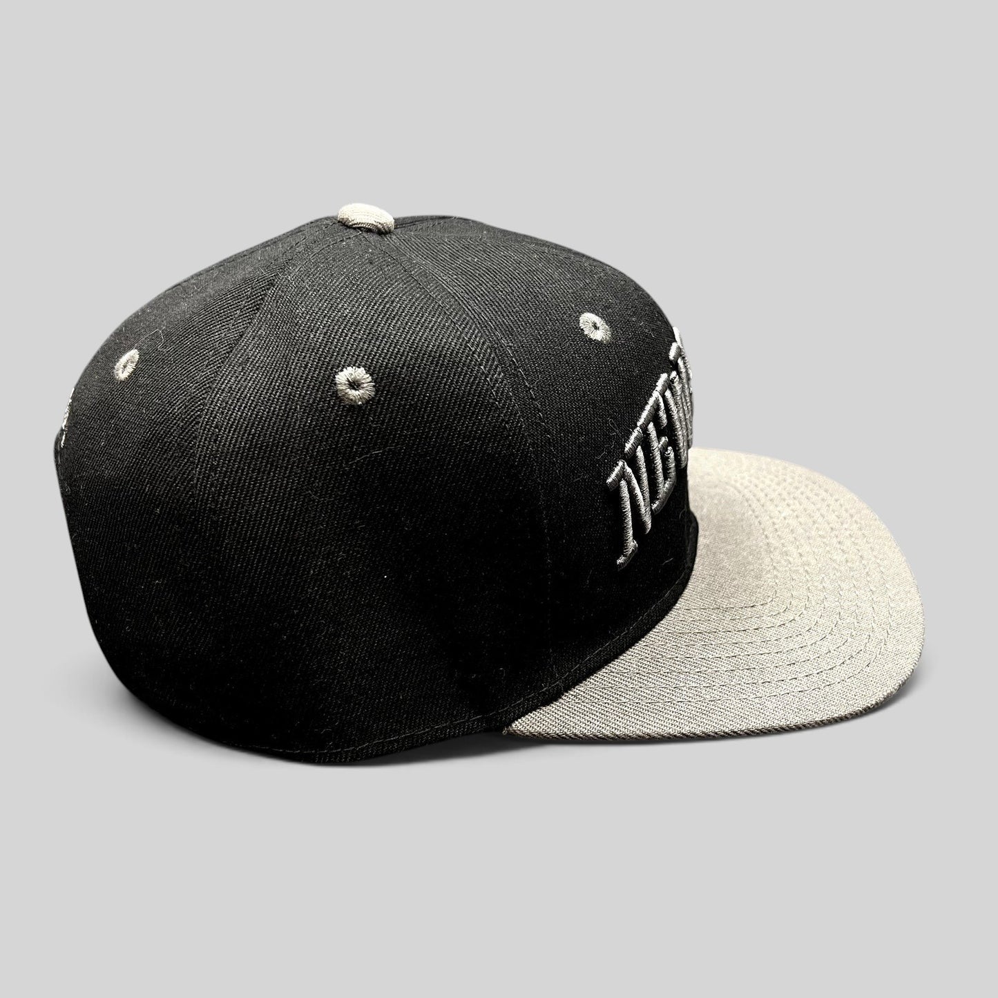 Raree Finds Newsboys Love Riot black and gray two-tone snapback hat with raised 3D embroidered lettering