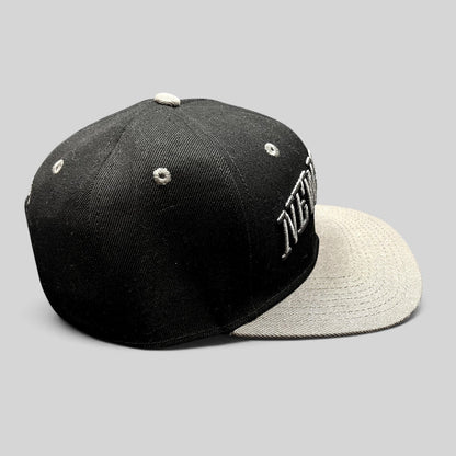 Raree Finds Newsboys Love Riot black and gray two-tone snapback hat with raised 3D embroidered lettering