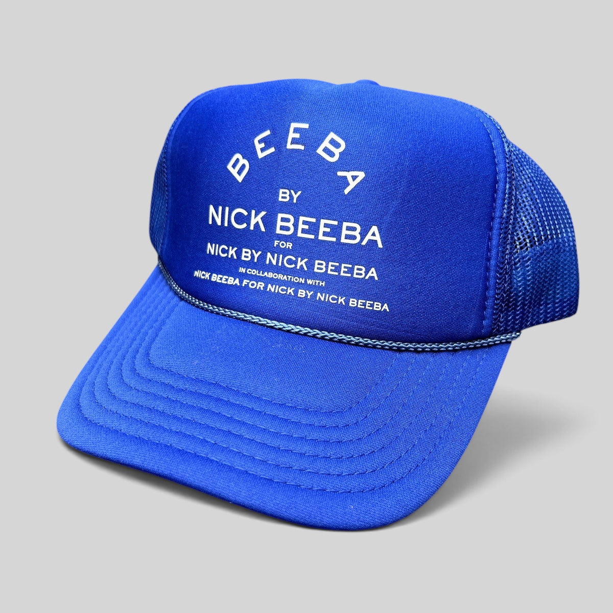 Raree Finds royal blue Nick Beeba foam front trucker hat with white repetitive graphic and mesh back snapback closure