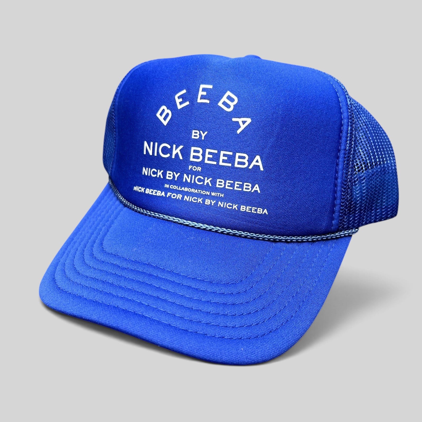 Raree Finds royal blue Nick Beeba foam front trucker hat with white repetitive graphic and mesh back snapback closure