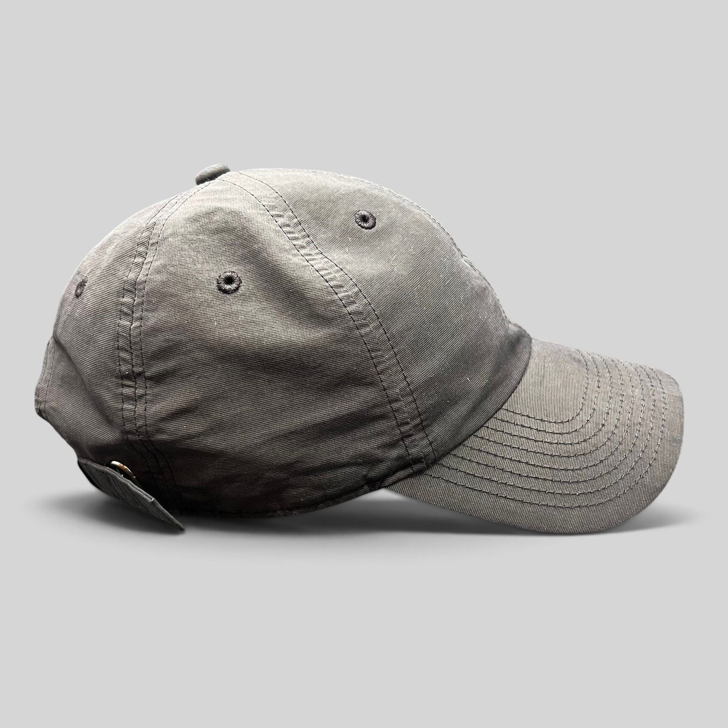 Raree Finds Nike Heritage 86 black unstructured strapback hat with a minimalist mini metal Swoosh logo