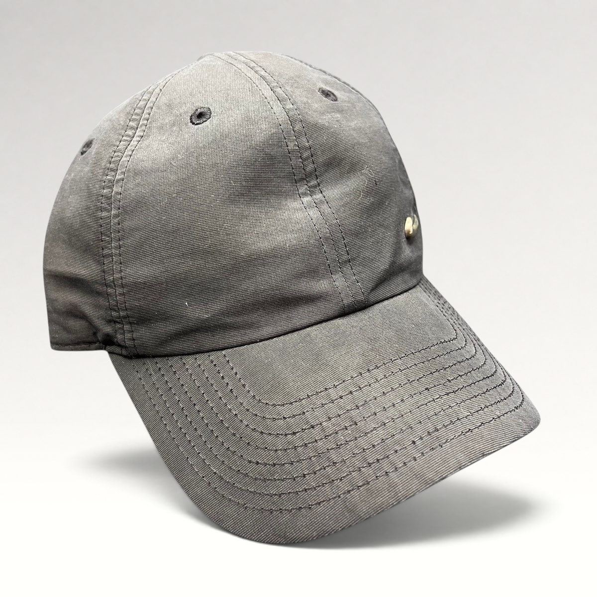 Raree Finds black Nike Heritage 86 unstructured strapback hat with a small metallic Swoosh logo on the front panel