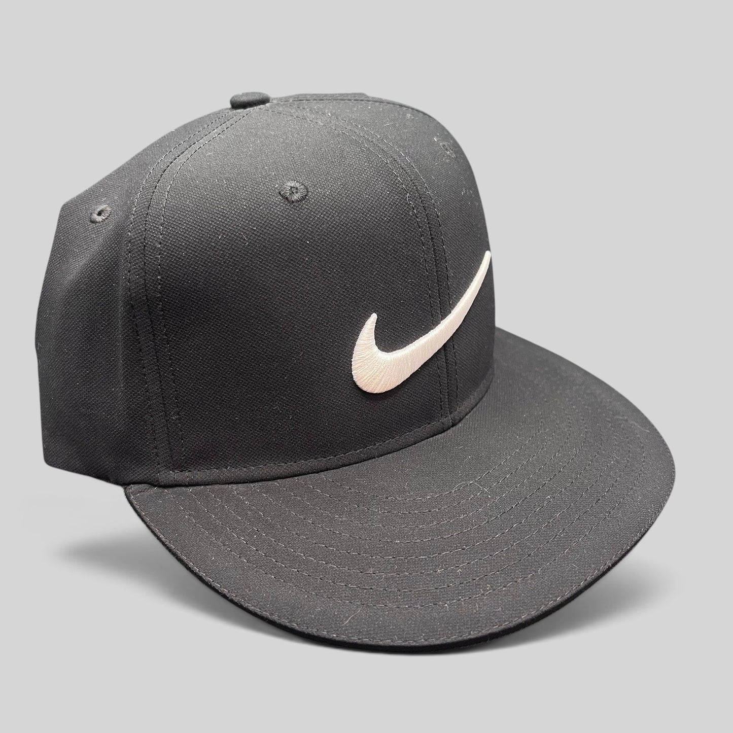 Raree Finds black Nike Golf fitted cap with white embroidered Swoosh logo on the front panel