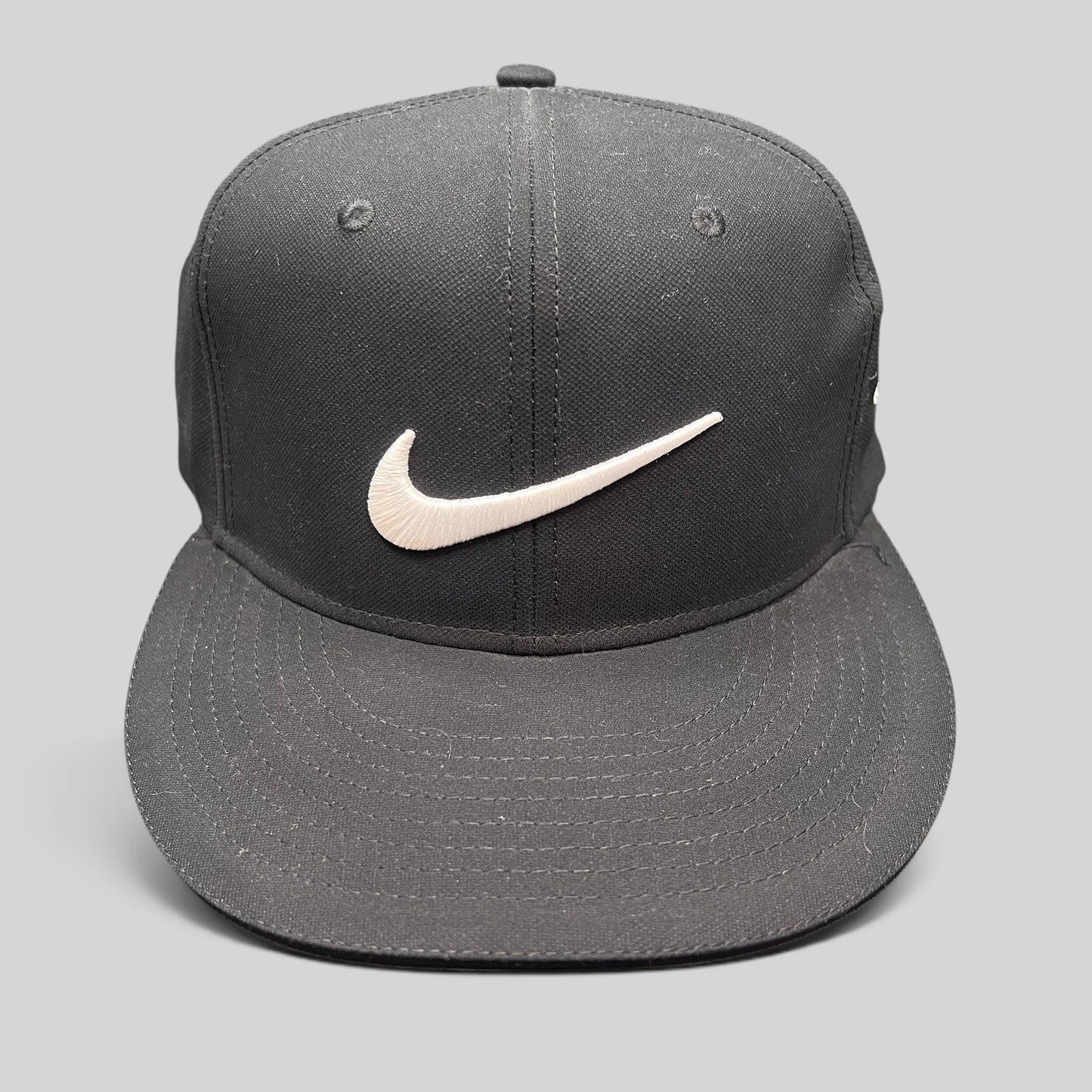 Raree Finds black Nike Golf fitted cap with white embroidered Swoosh logo and flat brim