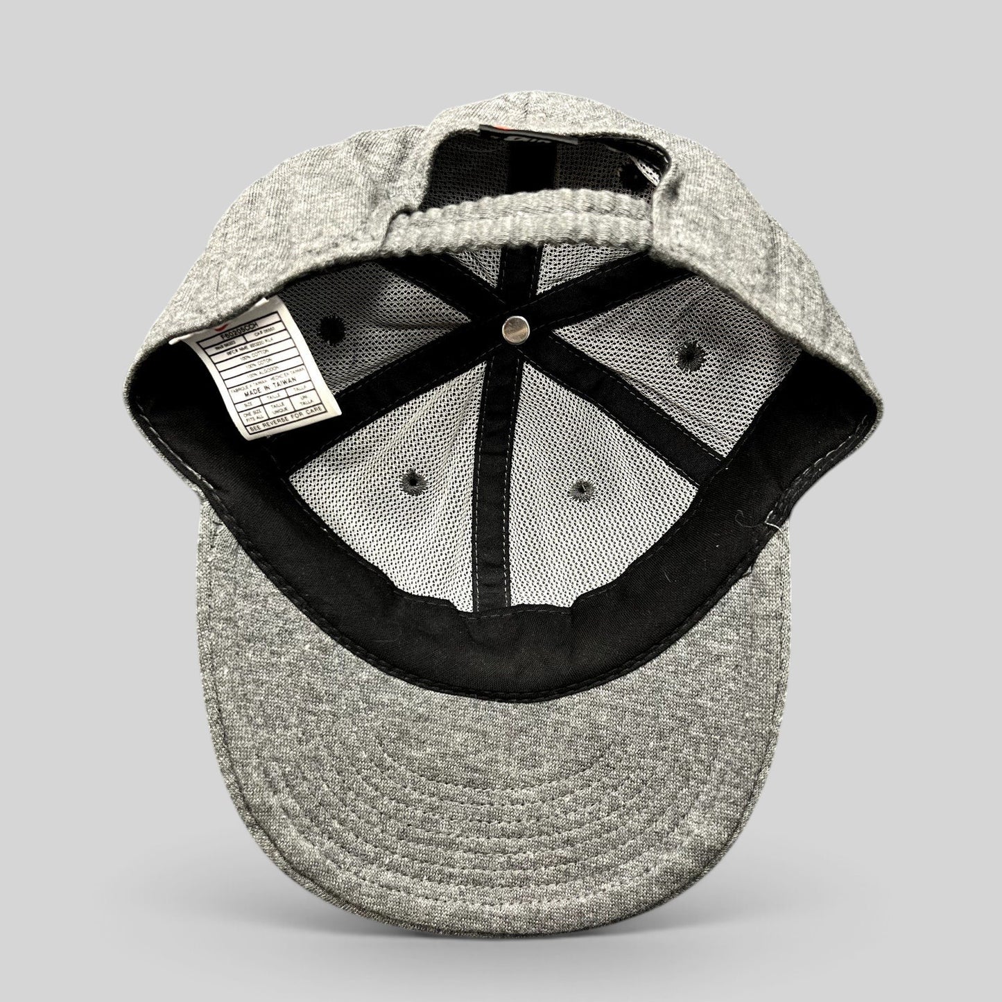 Raree Finds vintage Nike heather gray cotton strapback hat showing interior mesh lining and care tag
