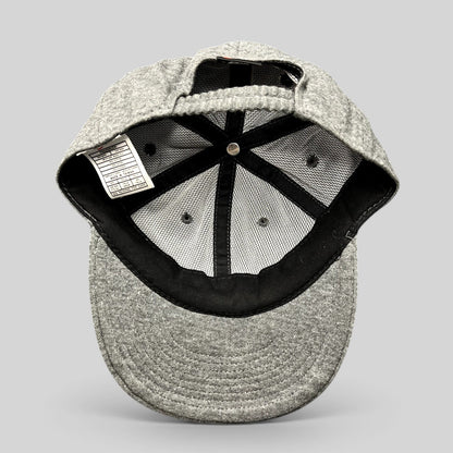 Raree Finds vintage Nike heather gray cotton strapback hat showing interior mesh lining and care tag