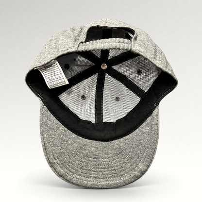 Raree Finds vintage Nike heather gray cotton strapback hat showing interior mesh lining and care tag