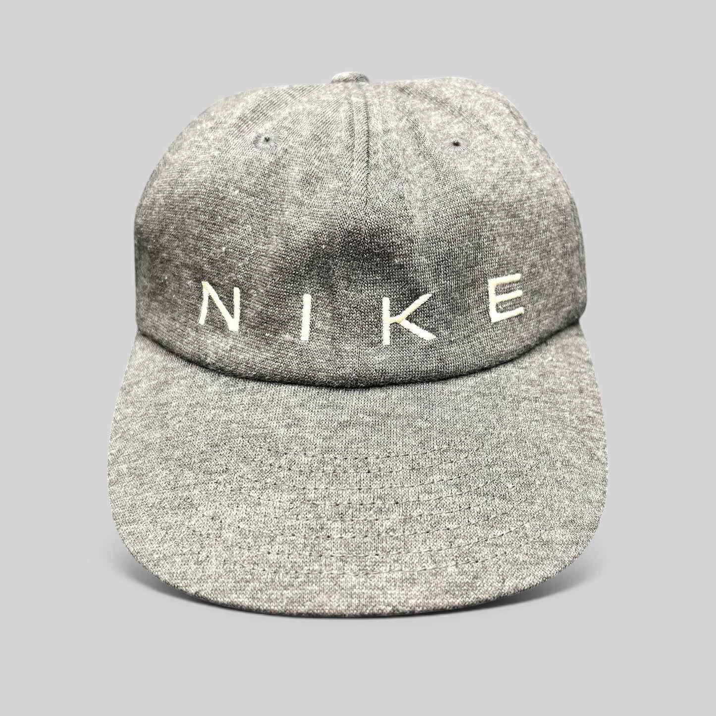 Raree Finds vintage Nike heather gray cotton strapback hat with white embroidered spellout logo on unstructured crown