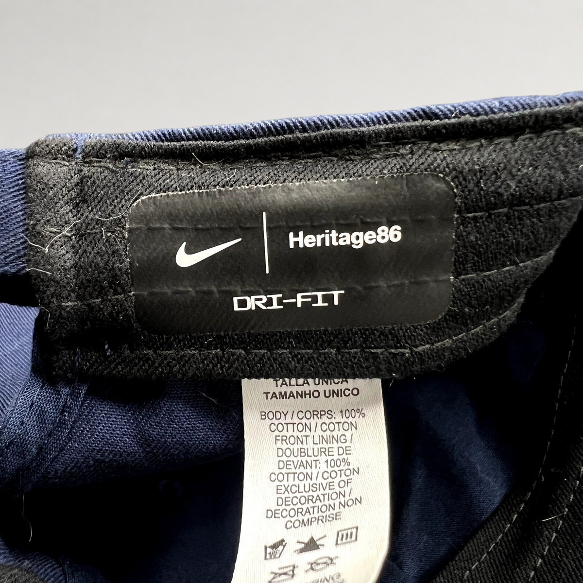 Raree Finds Nike Heritage86 Dri-FIT hat interior label showing cotton material and branding details