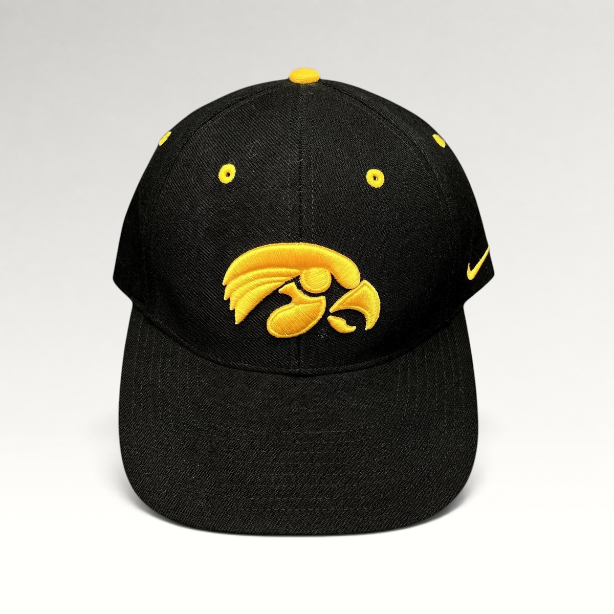 Raree Finds vintage Nike Iowa Hawkeyes strapback hat in black cotton twill with gold embroidered team logo and swoosh