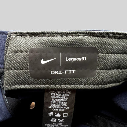 Raree Finds Nike Legacy91 Dri-FIT hat interior label showing material composition and branding details