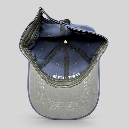 Raree Finds navy blue Nike Legacy91 NetJets cap interior showing structured six-panel construction and strapback.