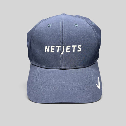 Raree Finds navy blue Nike Legacy91 Dri-FIT hat with white embroidered NetJets logo and Nike Swoosh on the brim