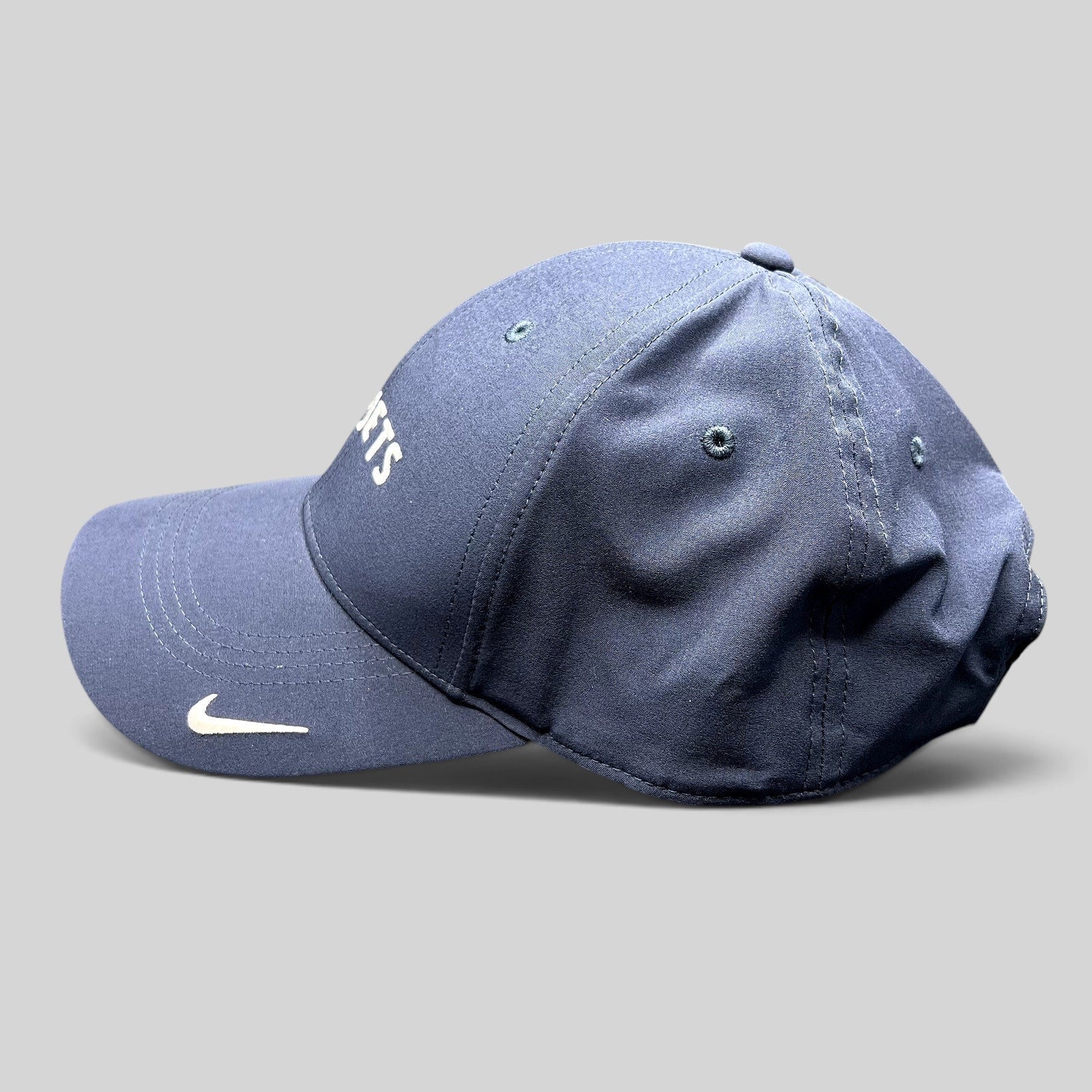 Raree Finds navy blue Nike Legacy91 Dri-FIT hat with white NetJets embroidery and Nike Swoosh on the brim