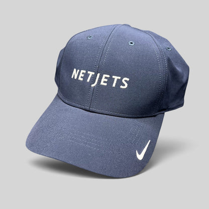 Raree Finds navy blue Nike Legacy91 Dri-FIT hat with white embroidered NetJets logo and Nike Swoosh on the brim.