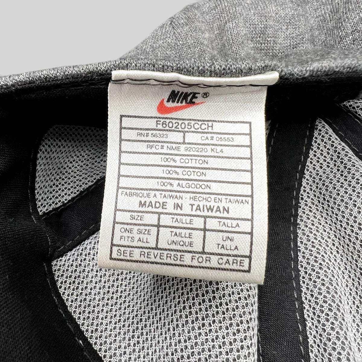 Raree Finds vintage Nike hat interior tag showing 100% cotton material and Made in Taiwan origin details