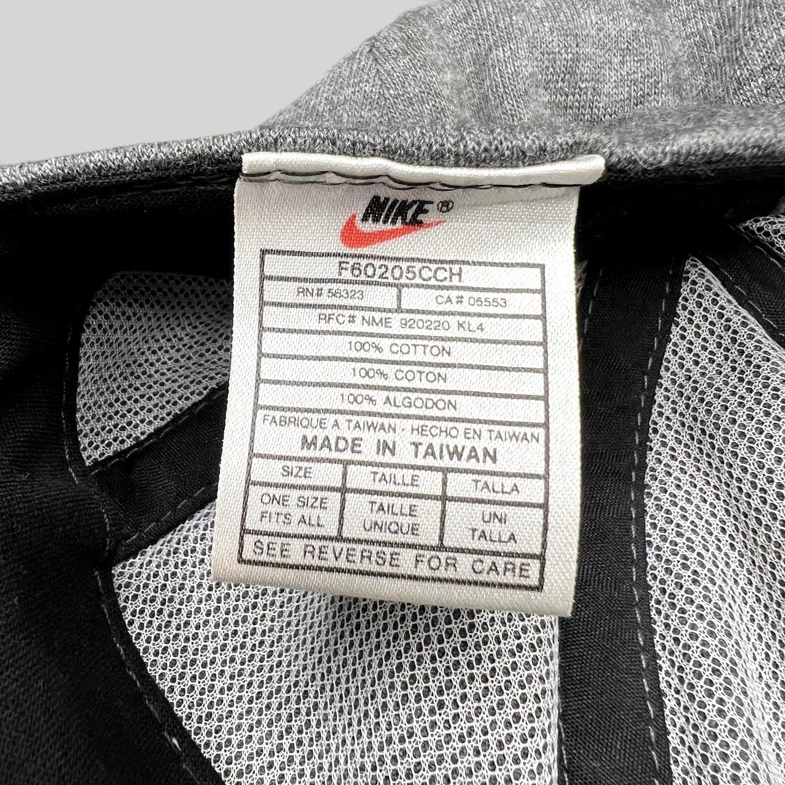 Raree Finds vintage Nike hat interior tag showing 100% cotton material and Made in Taiwan origin details