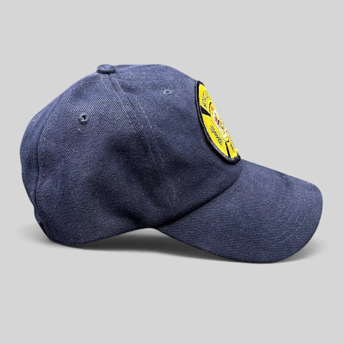 Raree Finds vintage Nissun navy blue cotton strapback hat with an embroidered Honolulu Fire Department patch.