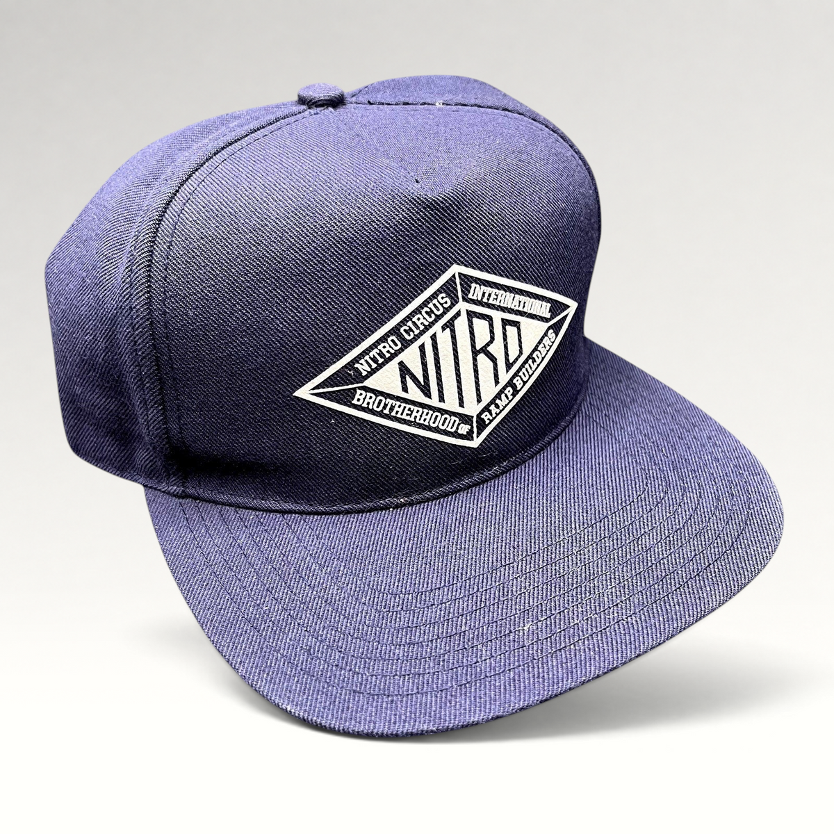 Raree Finds 47 Brand Nitro Circus navy blue snapback hat featuring a white Brotherhood of Ramp Builders graphic.