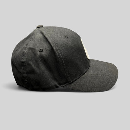Raree Finds black Nixon Watches fitted cap with white embroidered logo on a comfortable Flexfit stretch crown