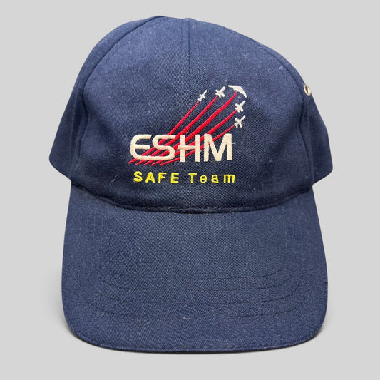 Raree Finds vintage navy blue cotton Northrop Grumman ESHM SAFE Team strapback hat with embroidered aircraft graphics.