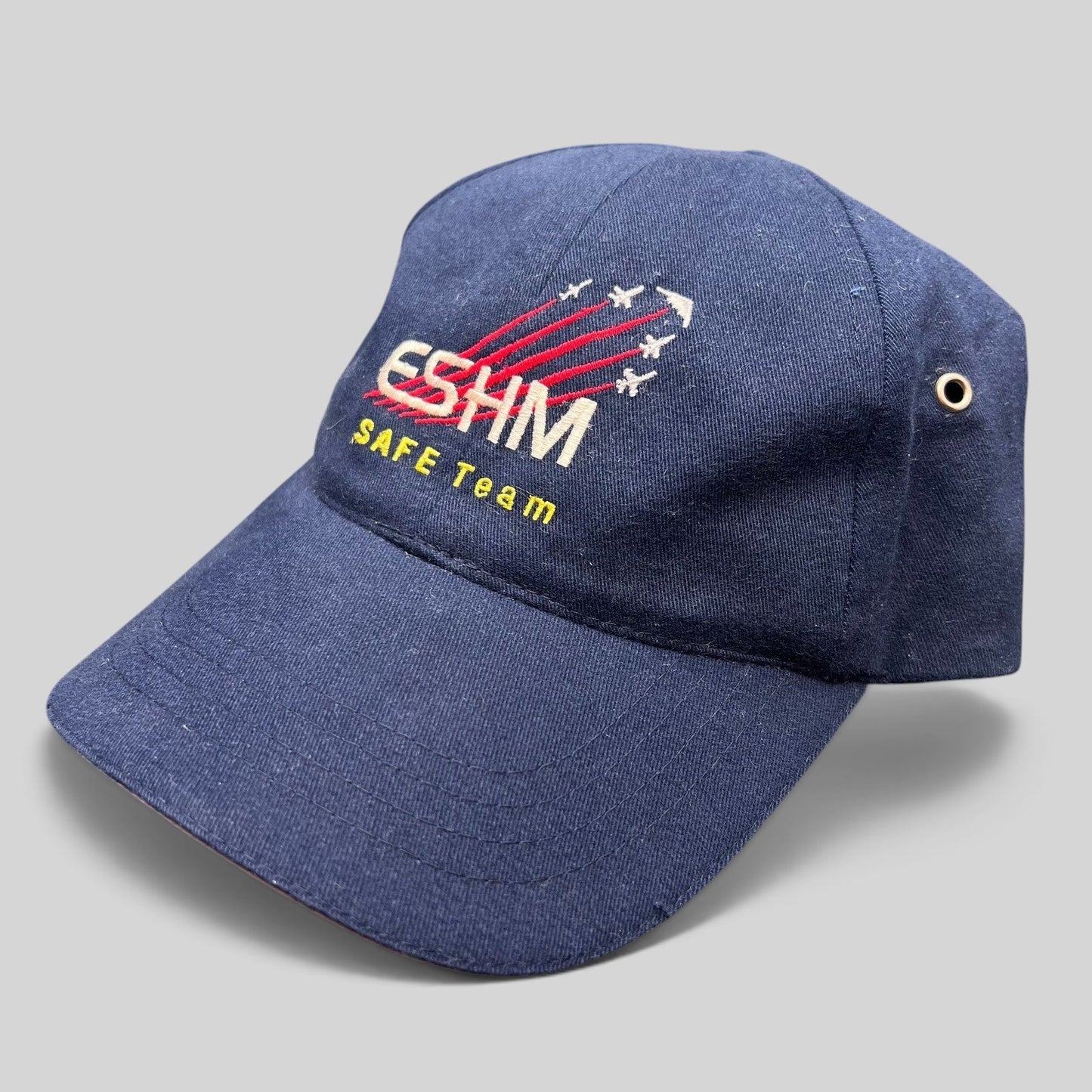 Raree Finds navy blue cotton strapback hat with embroidered Northrop Grumman ESHM SAFE Team logo and aircraft graphics