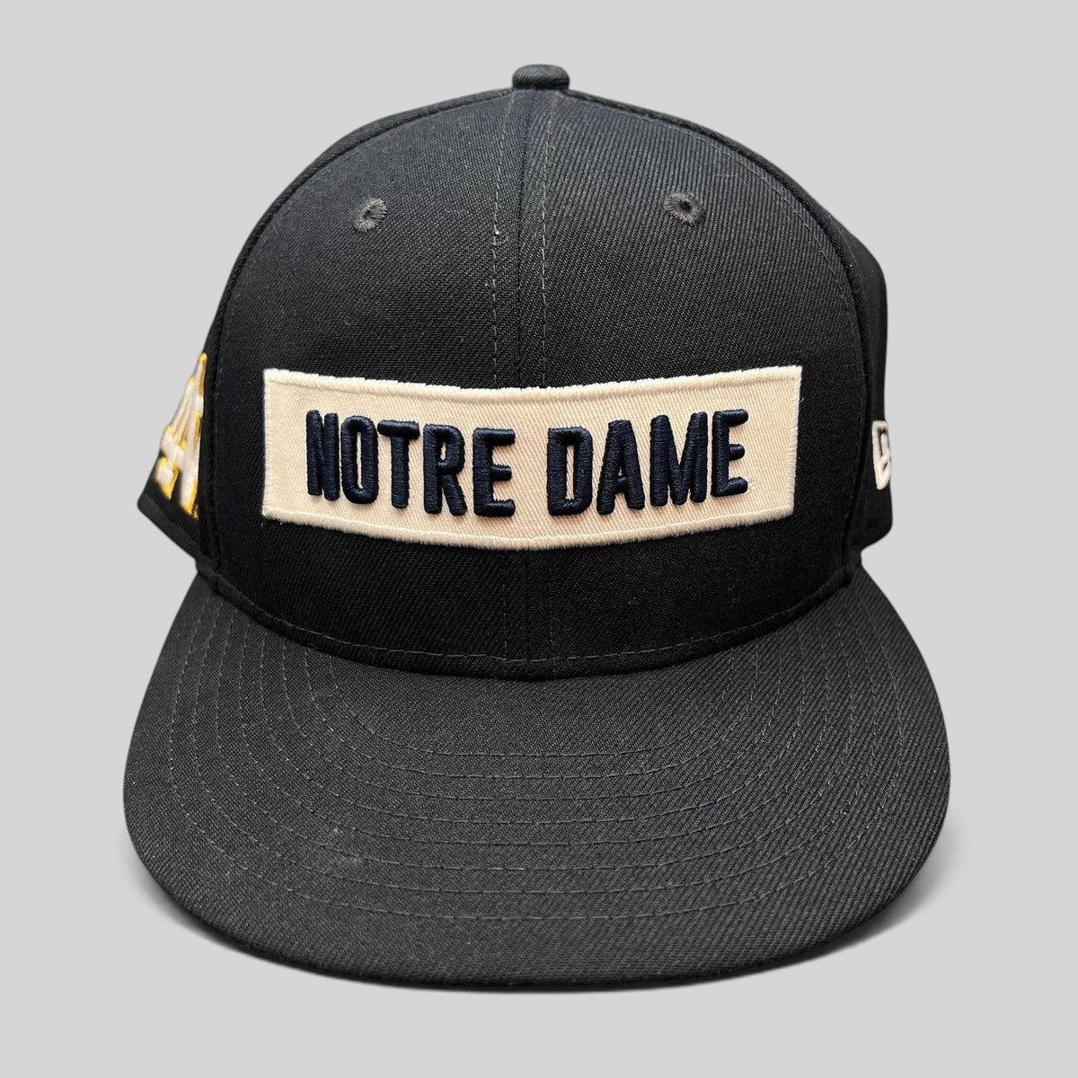 Raree Finds black Notre Dame Fighting Irish New Era 9FIFTY snapback hat with cream and navy wordmark patch